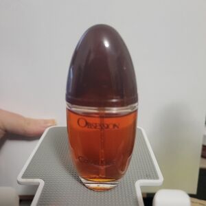 Calvin Klein Obsession with Brown Cap and Amber Hue